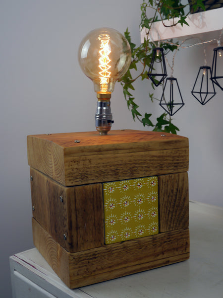 Scaffolding plank lamp with tile insert.