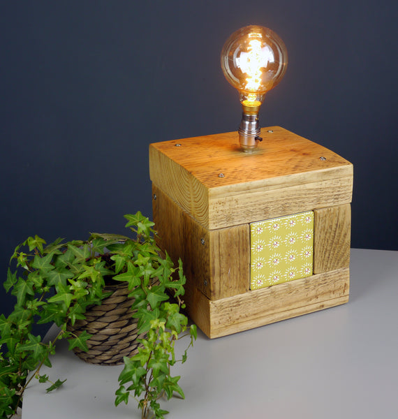 Scaffolding plank lamp with tile insert.